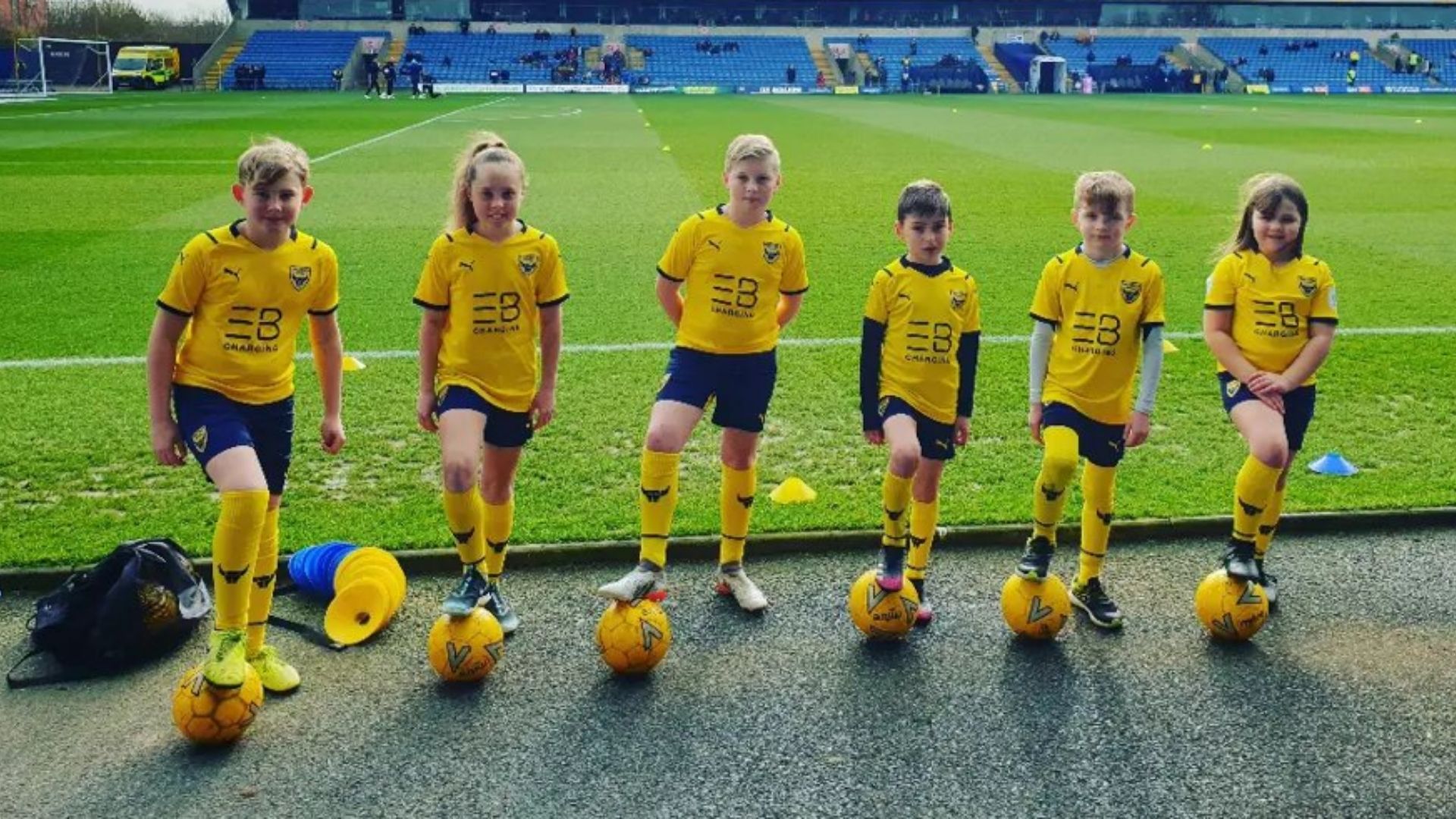 Oxford United football mascots on the pitch